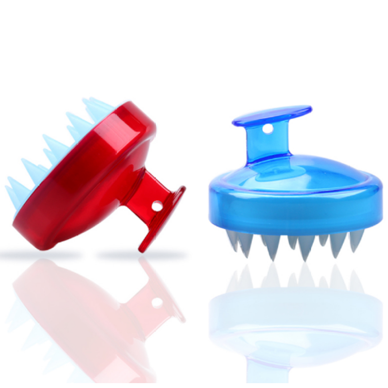 OVENIQO Soft Silicone Scalp Brush in use